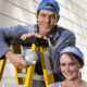 Young couple working on a house.