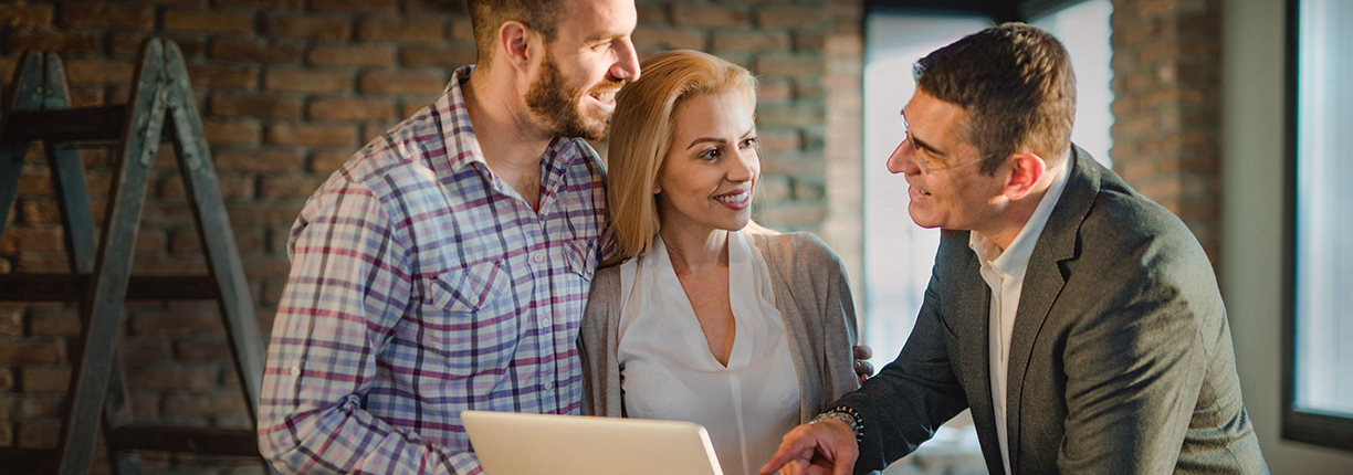 Young couple working with private lender